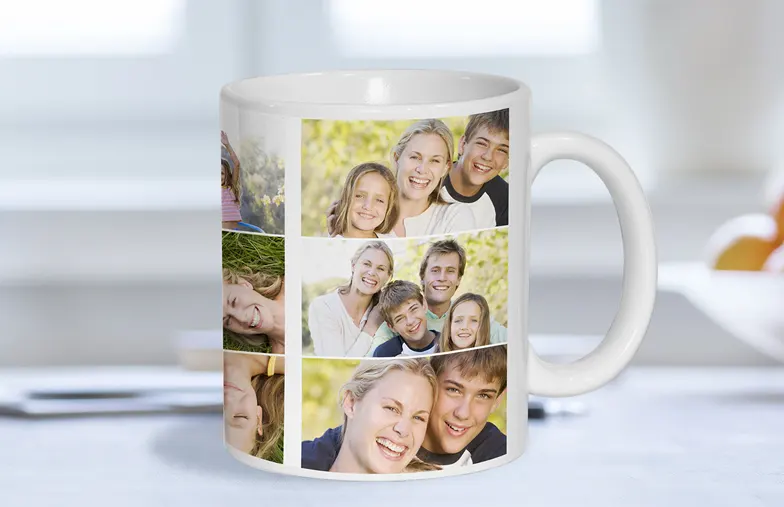 ["Personalised Photo Mugs from Printerpix", "Mother and baby holding a Printerpix cartoon-design mug with the word 'Dad'", "Personalised photo mug with a picture of a crawling baby in an animal onesie", "Mother and daughter holding custom-designed photo mugs with family photos", "Kissing couple with personalised mugs with text on them", "Personalised photo mug with a photo of your own dog", "", "", "", "", ""]||||||||||