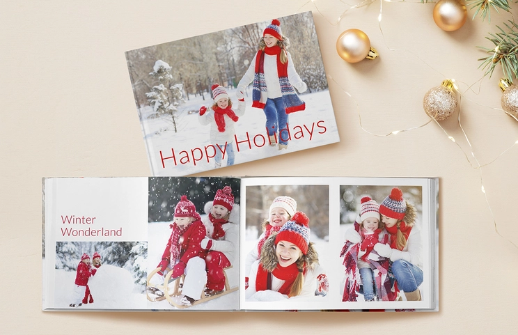 Hardcover Personalised Photo Books by Printerpix|Individually printed Printerpix photo album with hardcover and large photos of an older couple|Personalised photo album book with romantic pictures of a couple and photo cover|Family photo album with custom-printed cover and family name|Pet and woman looking at personalised family photo album with custom design|Two people viewing the Printerpix photo book with wedding photos and bride|||||