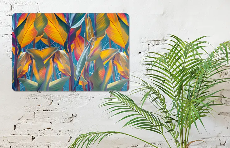 Aluminium photo print of a mountain and a lake, held by a woman, made by Printerpix