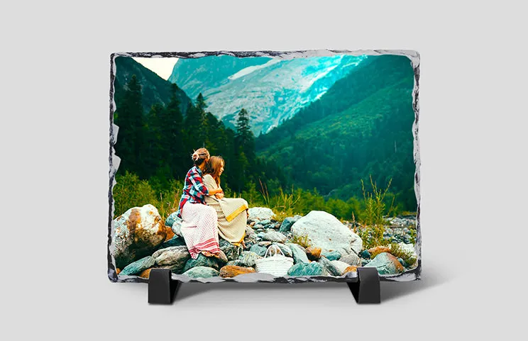 [ "Stone photo plaque", "Stone plaque with family photo", "Side view of the stone plaque with baby, mum, and dad", "Two young people printed on a stone", "Personalised gift stone with printed image", "", "", "", "", "" ]||||||||||
