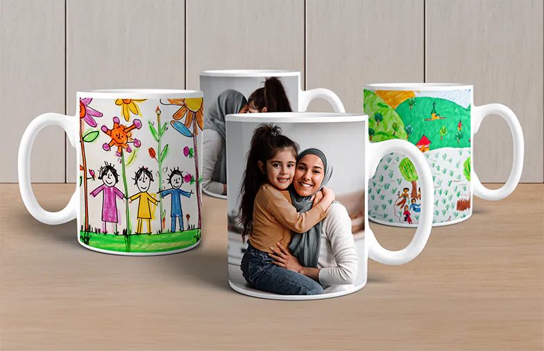 Mother and baby holding a custom mug with a cartoon design from Printerpix and the text "Dad"