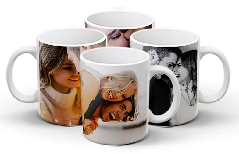 ["Personalised Photo Mugs from Printerpix", "Mother and baby holding a custom mug from Printerpix with cartoon design and 'Dad' text", "Personalised photo mug with a picture of a crawling baby in an animal onesie", "Mother and daughter holding custom photo mugs with family photos", "Kissing couple with personalised mugs with text", "Personalised photo mug with own photo of a dog on it", "", "", "", "", ""]||||||||||
