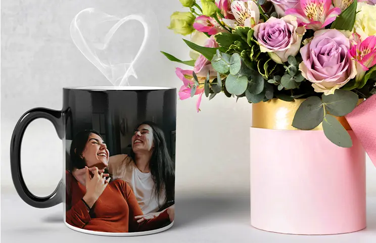 ["Printerpix Magic Mug with personalized baby photo revealed","Printerpix Magic Mug with personalized baby photo revealed","Young boy holding a custom-designed magic mug with his own photo","Magic mug with cat image, with tea being poured on the desk","Couple holding two heat-sensitive magic mugs with personalized text from Printerpix","Personalized magic mug with revealed photo of a young woman","","","",""]||||||||||