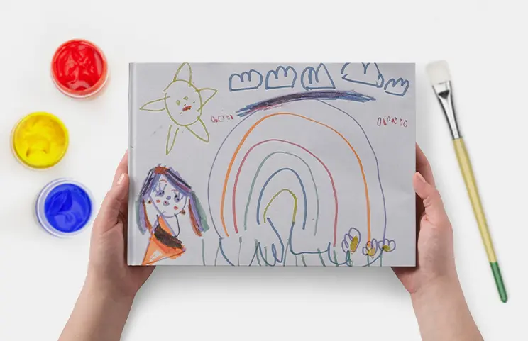 Custom-printed Printerpix photo album with hardcover and large photos of an elderly couple