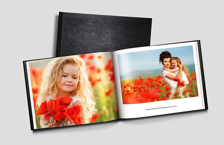 Leather Personalized Photo Books by Printerpix|Custom Printerpix Photo Book with Leather Cover and Personalized Design|Individually Designed Photo Album Open on the Table with Family Photo Collage|Wedding and Bridal Photos in Custom Printed Photo Album by Printerpix|Couple Looking at Custom Leather-bound Photo Book by Printerpix|Elderly Couple Printing Large Custom Photos in Leather Photo Album|||||