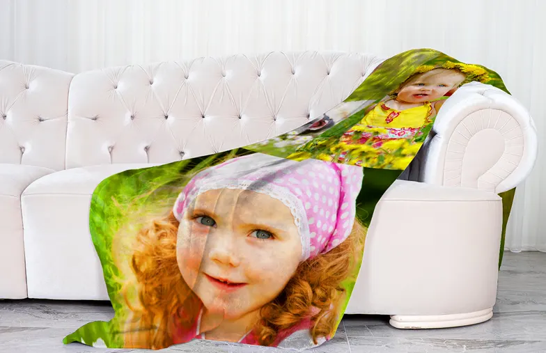 ["Mink Touch Photo Blanket by Printerpix", "Printerpix Photo Blanket with Family Photos", "Large Photo Blanket on Double Bed with Image of a Girl", "Photo Blanket Image with Size Comparison", "Photo Blanket Black-and-White Collage Image", "", "", "", "", ""]||||||||||