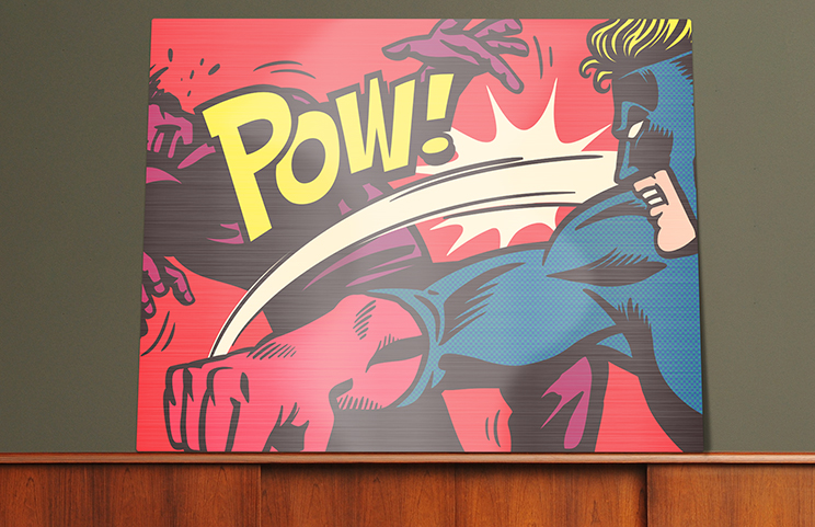 Metal photo print from Printerpix|Aluminium photo print of a mountain and a lake, held by a woman, made by Printerpix|Small square metal print of a man diving into a lake|Metal photo print of mother and daughter on a bookshelf|Woman placing metal print of friend and boyfriend on the wall|Three metal photo prints in different sizes|||||