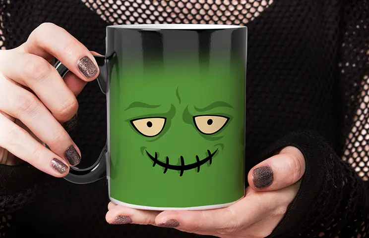 ["Colour-changing mug from Printerpix, reveals personal photo of a baby","Colour-changing mug from Printerpix, reveals personal photo of a baby","Young boy holding a custom magic mug with his photo on it","Magic mug with a cat picture, being filled with tea on a desk","Couple holding two colour-changing mugs with custom text from Printerpix","Personalised magic mug revealing a photo of a young woman","","","",""]||||||||||