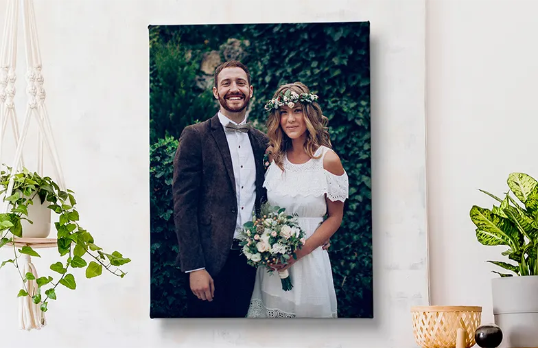 ["Personalised photo canvas prints from Printerpix", "Collage canvas print of two happy friends", "Canvas print sizes", "Mother tenderly kissing her young son on a canvas print", "Gallery wall with canvas prints", "Canvas print of a couple enjoying their holiday", "", "", "", ""]||||||||||