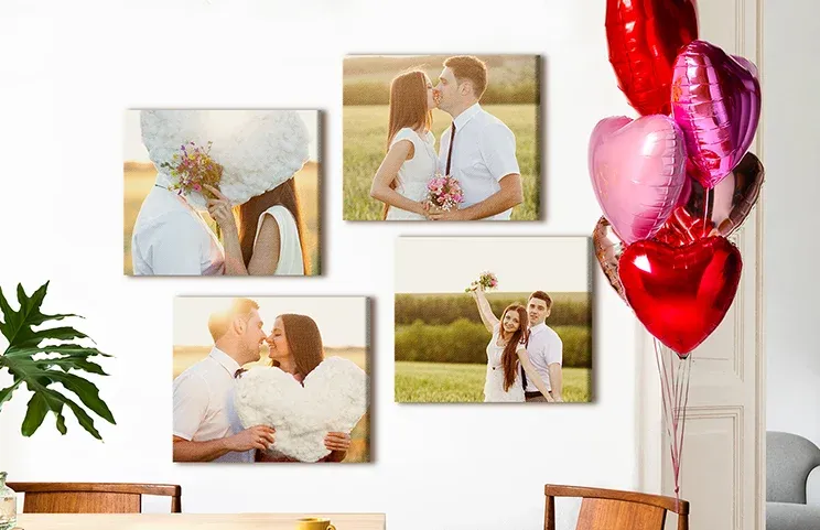 Foto Canvas Displays by Printerpix|Six square photo canvases from Printerpix on a living room wall with family and children photos|Man and woman hanging a photo canvas with a holiday picture|Woman hanging three black-and-white family photo canvases|Mother and four young children sitting on the sofa in front of four photo canvases|Couple in front of a blue wall with nine square photo canvases|||||