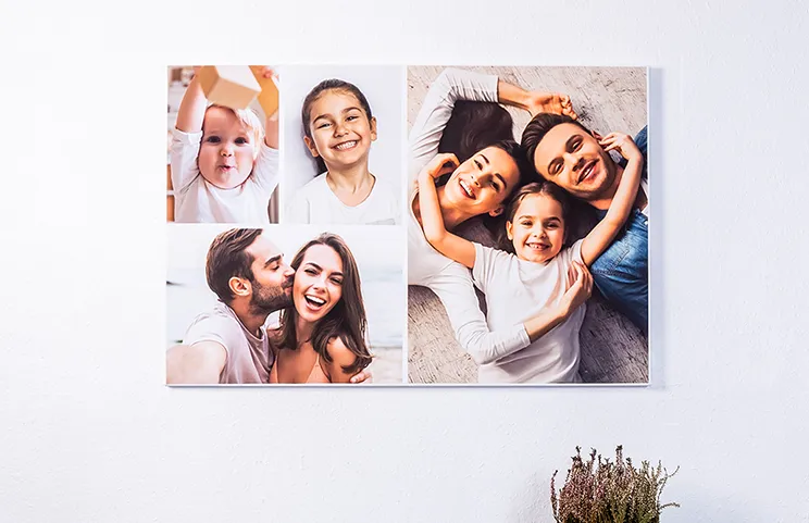 Photo collage of holiday photos on canvas print hung on the wall