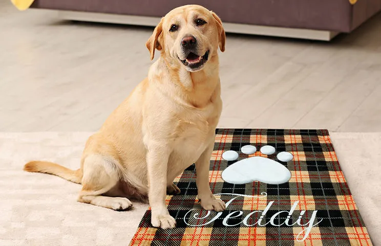 Labrador on personalised dog blanket with paw print design