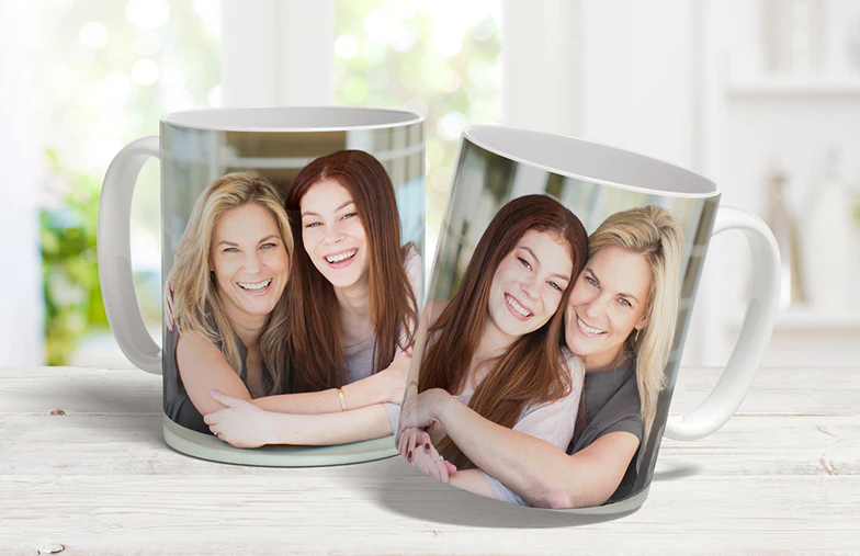 Kissing couple with personalised mugs with text