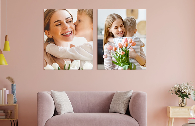 Woman placing metal photo print of friends on the wall