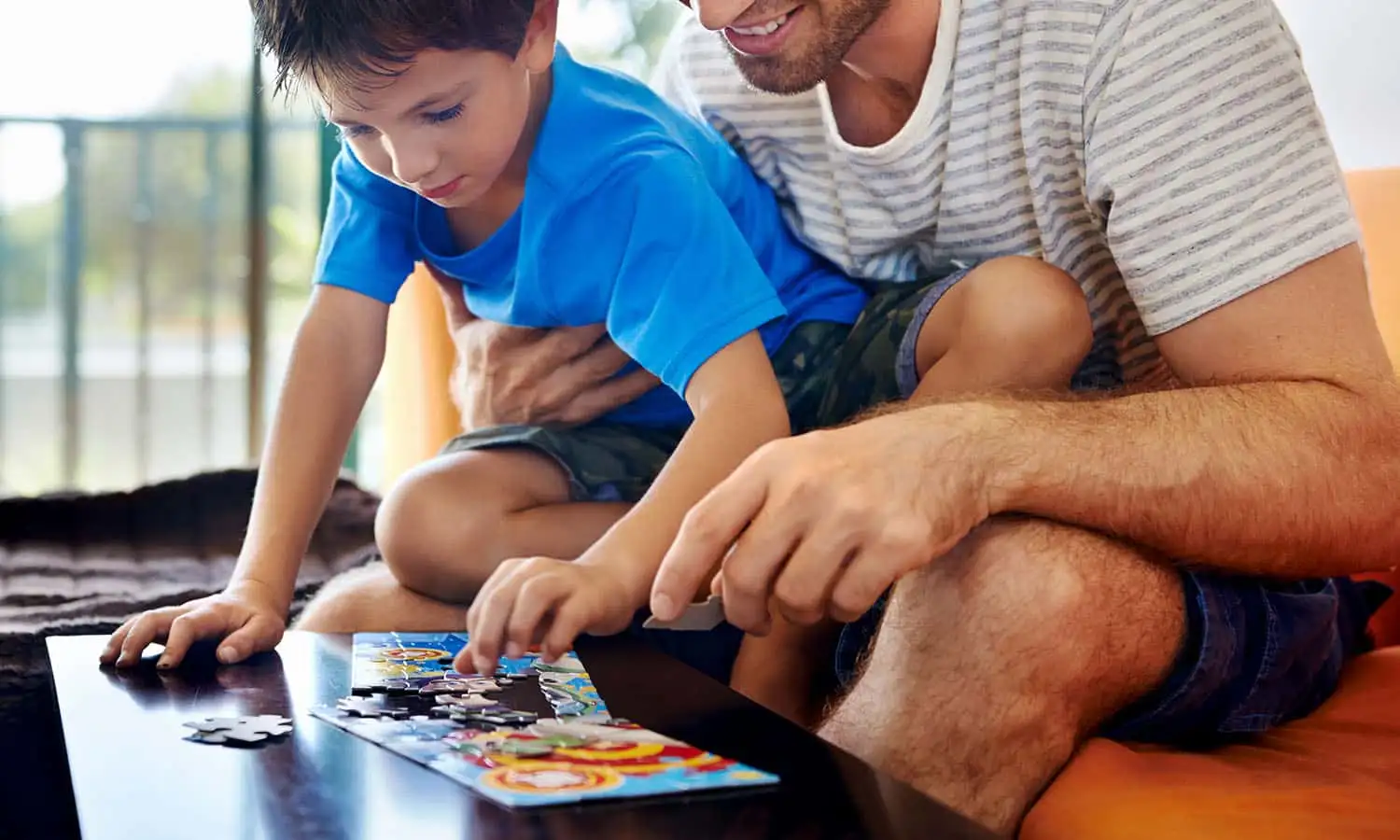 Close-up of personalised cardboard puzzle with family photo
