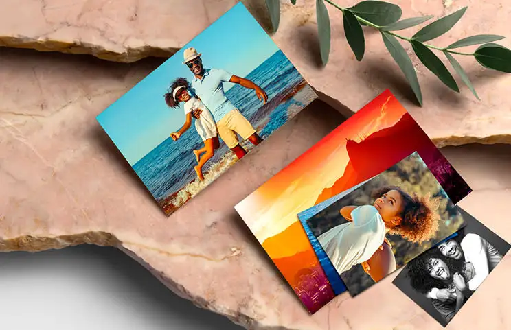 Various sizes of online photo prints of photos taken with a mobile phone of the family