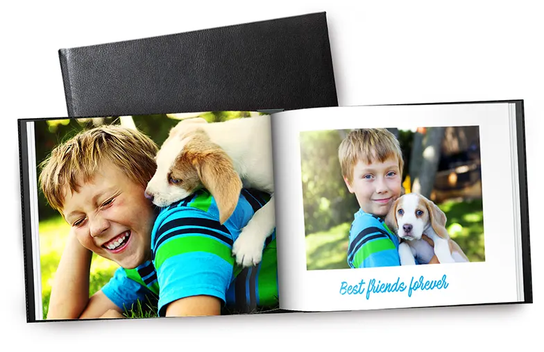 Older couple printing large custom photos in a leather photo album