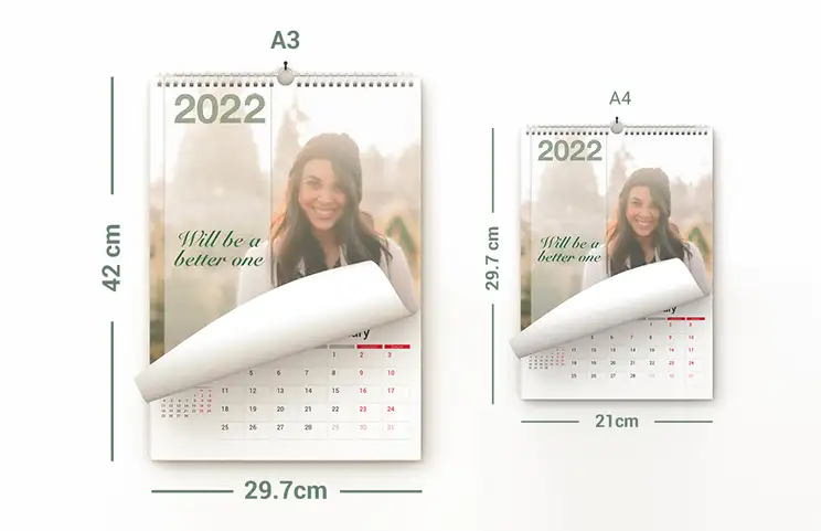 Dog photos on a customised photo calendar hanging on the wall