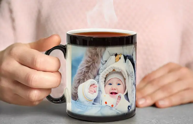 Personalised colour-changing mug revealing a photo of a young woman